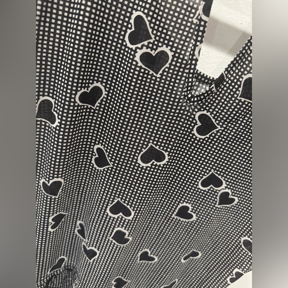3/$20 Reitmans Sheer Black and White Heart Blouse with ruffle style bottom - Picture 6 of 6